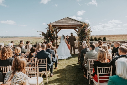 British flower floral columns for an outdoor wedding ceremony Autumn for Wiltshire Wedding Chalk Barn Dan Watkins My Flower Patch