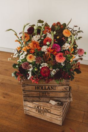 Vintage crate filled with British grown Autumn flowers and foliage for a Wiltshire Wedding Chalk Barn Dan Watkins My Flower Patch